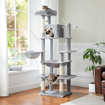 Light gray cat tree in a living room by the window