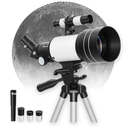 70mm refractor telescope with Barlow lens and three eyepieces in front of the Moon