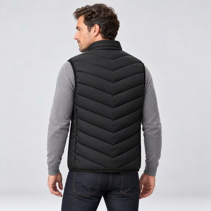 Man wearing the heated vest, back view